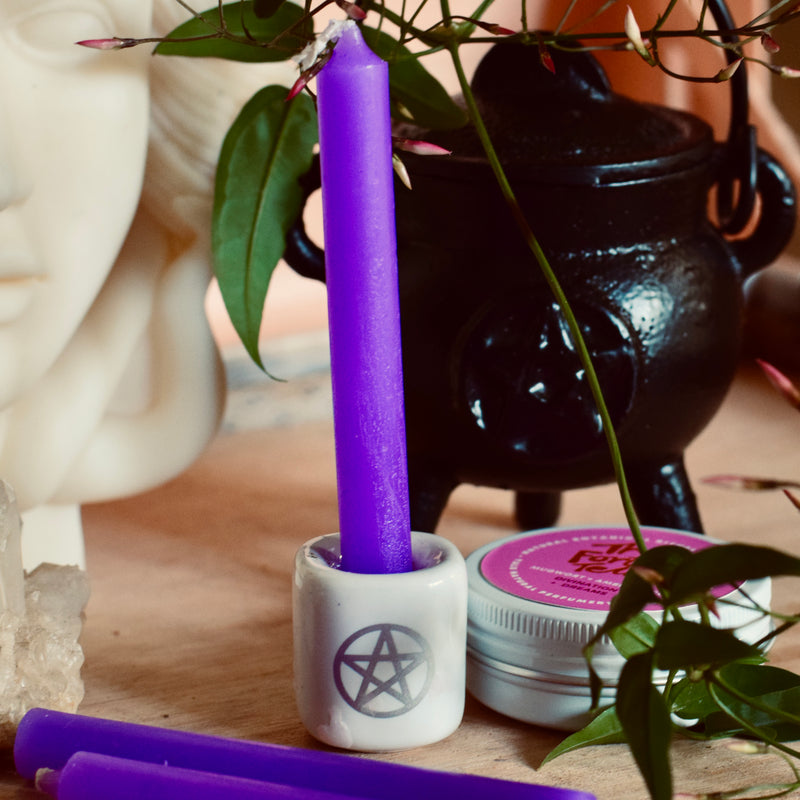 purple spell candle